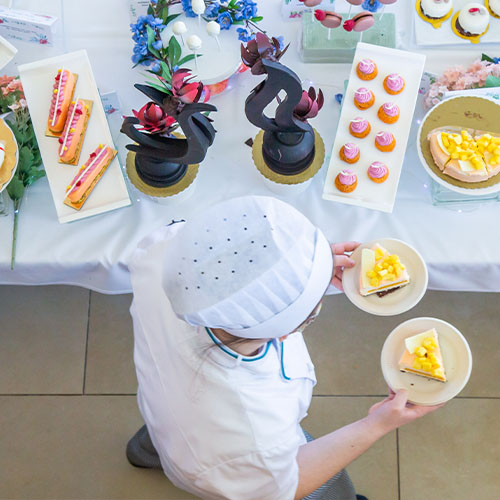 culinary student serving pastries
